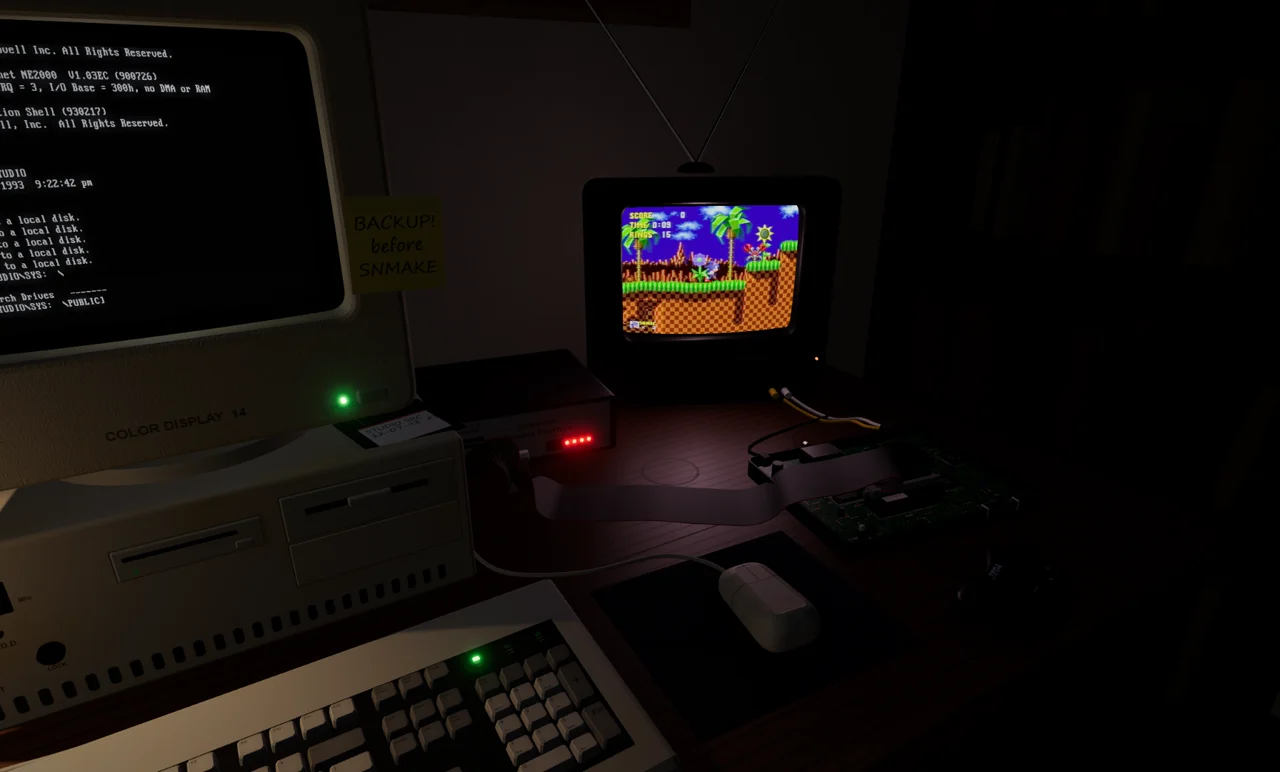 The right side of the desk: the Console Interface with its red LEDs, a grey ribbon running to the opened Genesis board, and the TV showing Green Hill Zone