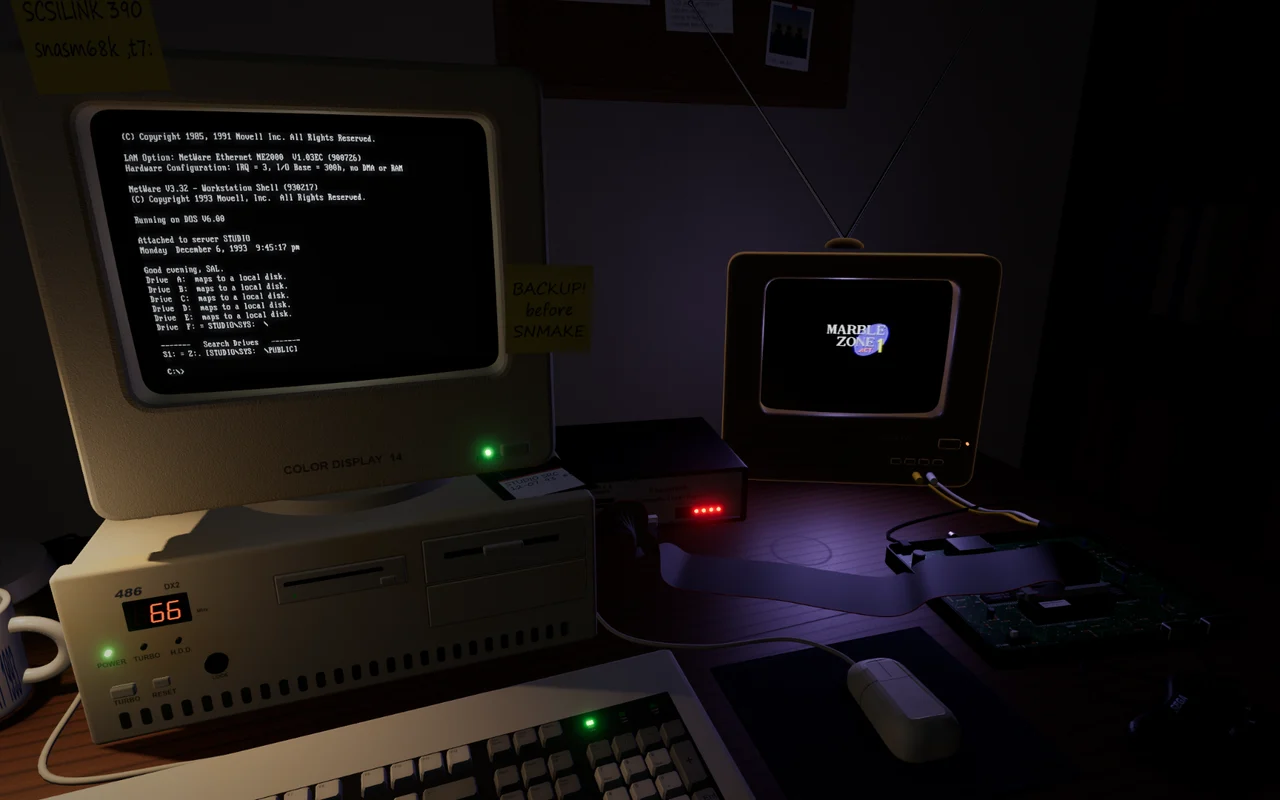 The 486 with its beige monitor showing the NetWare login, the Console Interface’s red LEDs, and the small TV showing Marble Zone, its purple light falling across the desk